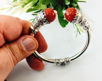 Carnelian cuff bracelet in sterling silver 925 with perforated byzantine bezels, silver bracelet