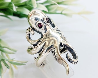 Sterling silver octopus ring with garnet eyes – adjustable statement ring for ocean lovers