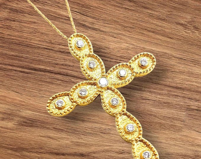 Handmade cross in k18 gold with diamonds and byzantine granulations, gold cross