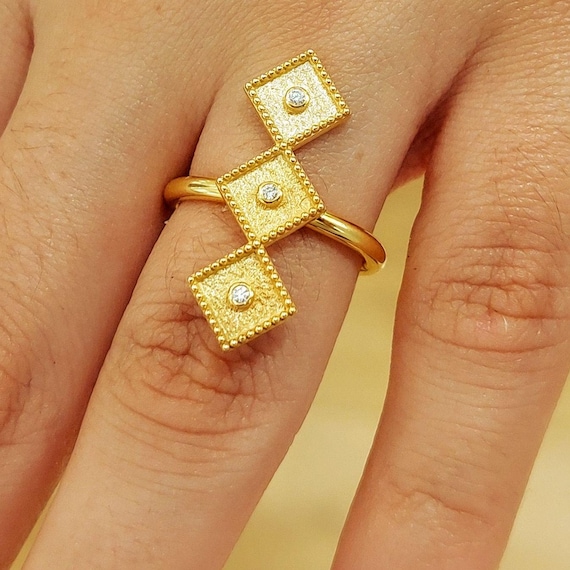 Byzantine ring in 18k gold with diamonds, geometric schemes jewellery.