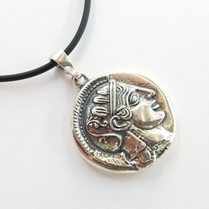 Athena the Goddess replica coin in sterling silver 925. A silver coin pendant with Goddess Athena on one side and Athena owl (with wings open) on the other.