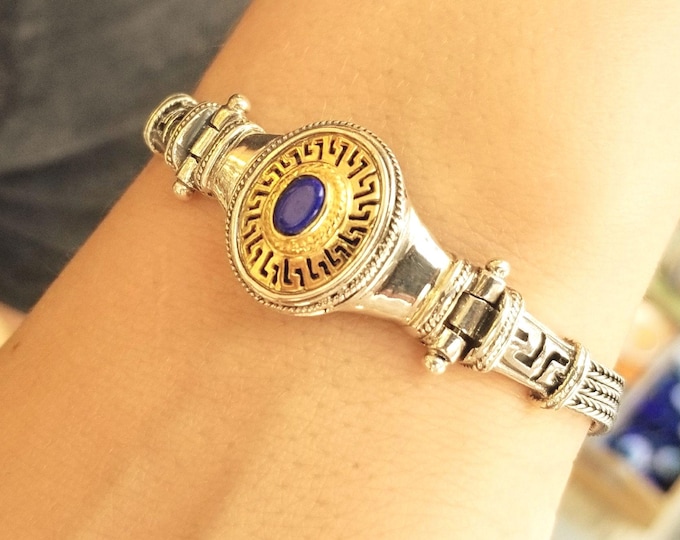Greek meander bracelet in two-tone silver with lapis lazuli.