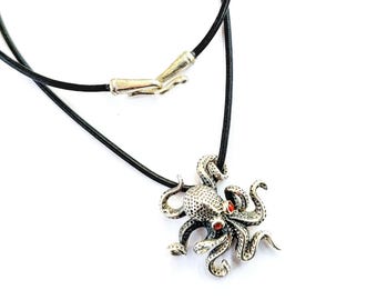 Textured octopus necklace in sterling silver 925, on black leather chord.
