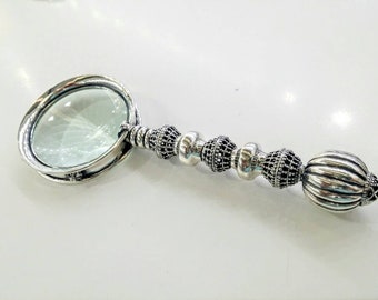 Sterling silver magnifying glass, collector gift