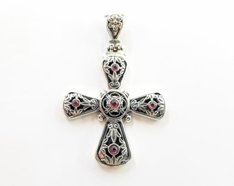 Garnet cross pendant with byzantine decorations in sterling silver 925