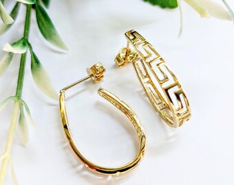 Greek key earrings in 14K gold, oval hoop earrings with perforated meander motif