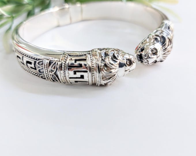 Sterling silver double lion heads bracelet with Greek key design and smooth lining