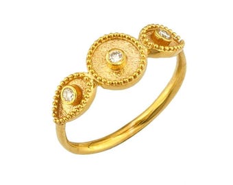 Elegant 18k Gold, Diamond Ring  with granulated bezels and geometric byzantine themes.