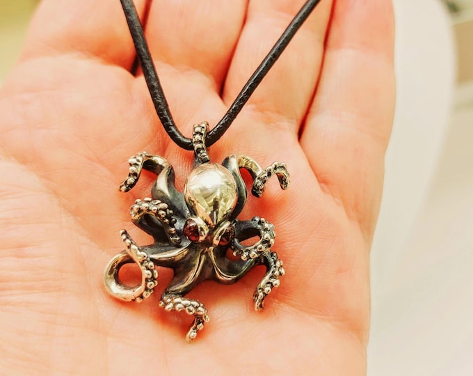 Silver octopus pendant on black leather cord, octopus necklace, marine-life jewelry, silver sea-creature.