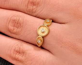 Elegant 18k Gold Diamond Ring  with granulated bezels and geometric byzantine themes.