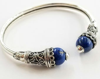 Lapis lazuli bracelet in sterling silver with byzantine bezels.