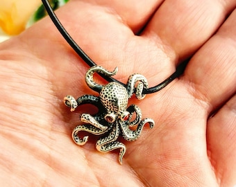Textured Sterling Silver Octopus Necklace, Garnet-Eyed Octopus Pendant, Ocean-Inspired Jewelry