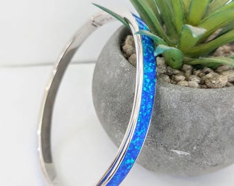 Blue opal bangle bracelet in sterling silver 925, comfort fit cuff with clasp.