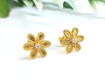 K18 Gold Floral Stud Earring with byzantine granulations and diamond centre.