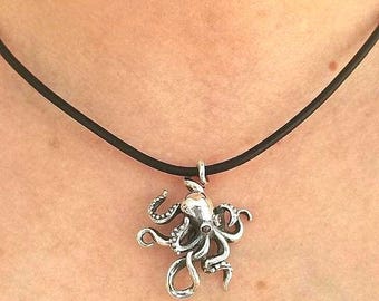 Octopus pendant in sterling silver 925 with intricately detailed tentacles, on black leather cord.