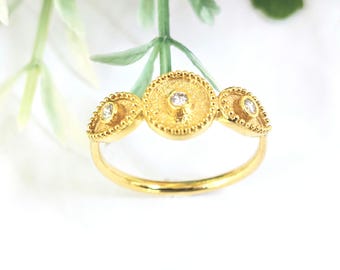 Elegant 18k Gold Diamond Ring  with granulated bezels and geometric byzantine themes.