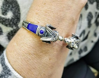Sterling Silver Ram Head Bracelet with Lapis Lazuli Inlays and Byzantine perforations on the shank.