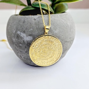 Disc of Phaistos necklace in k14 gold, ancient Greek calendar jewelry
