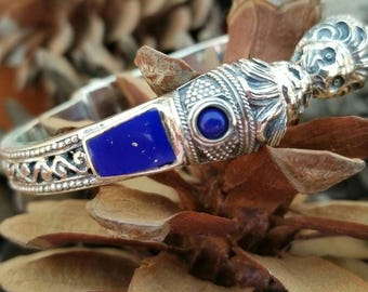Sterling silver lion bracelet with lapis lazuli inlays and byzantine perforations, lion jewellery