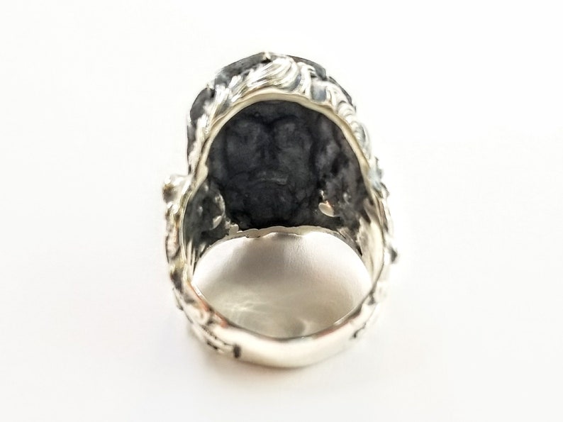 Silver ring depicting the ancient Greek God, Poseidon and his trident. Silver Neptune ring. The ring is handmade in sterling silver and is available in all sizes. Poseidon was the Greek God of the sea