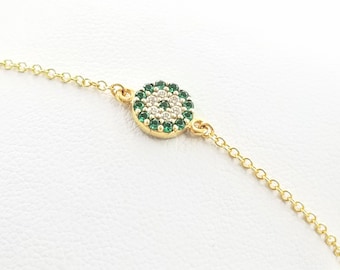 K14 gold evil eye bracelet with green zirconia