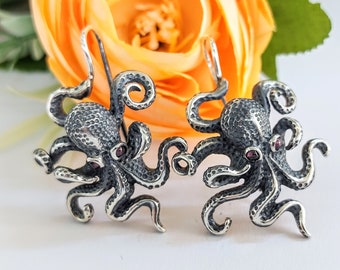 Silver Octopus Earrings with darkened features.