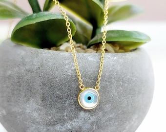 14K Gold Eye Necklace with gold chain, round evil eye jewelry in mother of pearl.