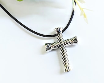 Cross pendant in sterling silver with Jesus Christ Conquers inscription