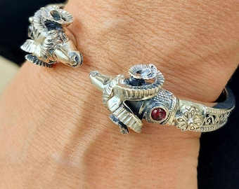 Byzantine style ram bracelet in sterling silver with lapis or garnet decoration