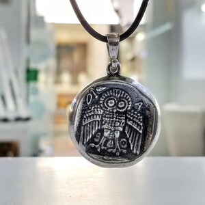 Athena the Goddess replica coin in sterling silver 925. A silver coin pendant with Goddess Athena on one side and Athena owl (with wings open) on the other.