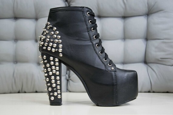 Black synthetic leather boots studded 