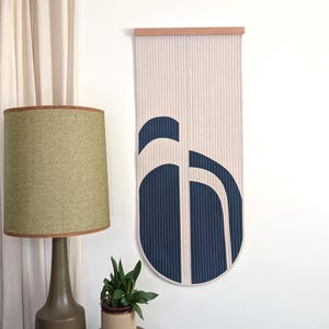 Navy Blue and Natural Linen Quilted Wall Hanging - Narrow Wall Tapestry with Wooden Hanger and Round Bottom - Hand Made Textile Wall Art