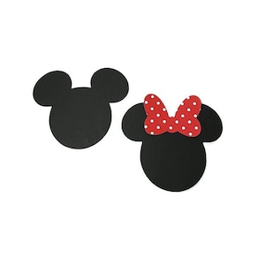 May include: Two black Mickey Mouse head cutouts, one plain and one with a red bow with white polka dots. The cutouts are on a white background. These are ideal for crafting and party decorations.