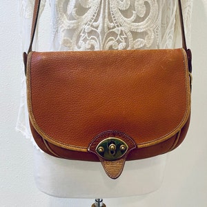 Vintage Saddle Tan &#39;Dooney & Bourke&#39; All Weather Leather Cross Body Bag