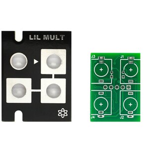 May include: A black circuit board with four white buttons and the text "LIL MULT". A green circuit board with four sets of connectors labelled J1, J2, J3, and J4.