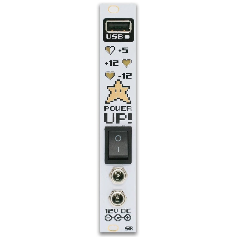 May include: A white electronic device with a USB port, a black on/off switch, and two DC power ports. The device features pixelated graphics of hearts, a star, and the words "POWER UP!"