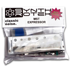 May include: A clear plastic bag containing a DIY kit for an MST Expressor, a synthesizer module. The kit includes a silver metal panel with the words "EXPRESSOR" and "OUT" printed on it, along with various electronic components and a blue foam pad.