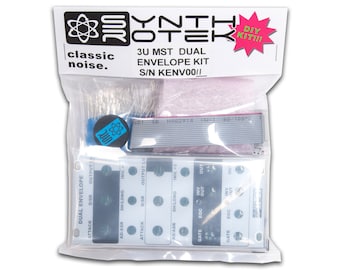May include: A clear plastic bag containing a DIY electronics kit for a dual envelope module. The kit includes a printed circuit board, a ribbon cable, resistors, and other electronic components. The bag has a label that reads "Synthrotek 3U MST Dual Envelope Kit S/N KENV001/ DIY Kit!! classic noise."