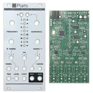 May include: A close-up of a silver-coloured electronic music synthesizer module with the text "Plaits" printed on the front. The module has knobs, buttons, and jacks for connecting to other electronic instruments. The module is shown next to a green circuit board with electronic components.