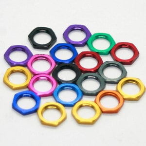 CosmoNuts - Anodized Hex Nuts for Eurorack Modules