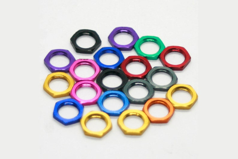 CosmoNuts Anodized Hex Nuts for Eurorack Modules image 1