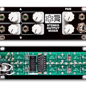 May include: A black and green circuit board with a black box on top. The box has knobs and jacks and says "Stereo Output Mixer".