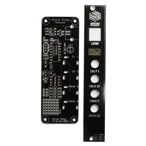 May include: A black Sound Study Modular synthesizer circuit board with a black front panel. The front panel has a USB port, MIDI input, two outputs, and two gates. The text "Sound Study Modular" is printed on the circuit board.