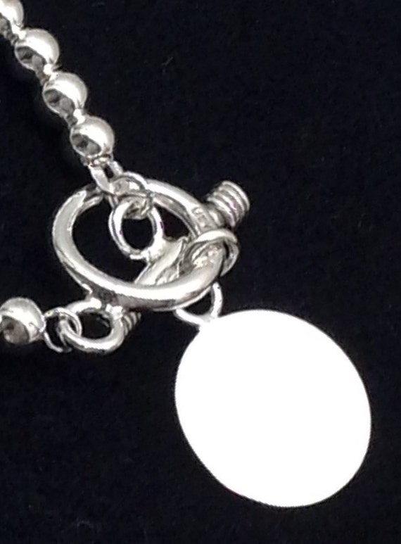 vintage sterling silver disc Gem