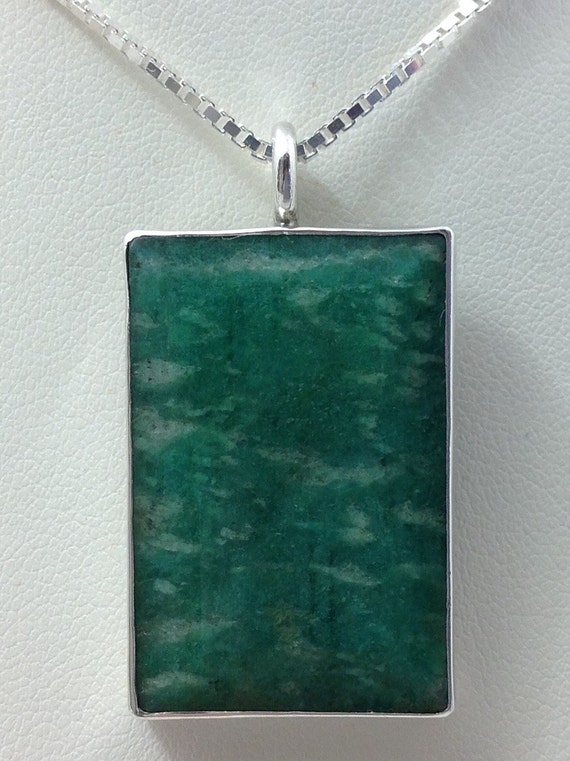 Large Amazonite pendant set in SS on med. chain.