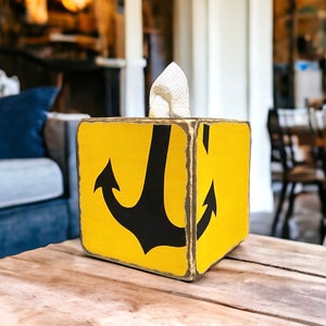 Coastal Anchor Tissue Box Cover in a nautical-themed beach cottage or vacation rental, featuring hand-painted anchor design for coastal décor, beach cottages, vacation homes, or seaside cabins, ideal for bedrooms, bathrooms, or living spaces, handmade in Maine