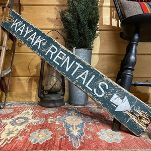 Kayak Rentals wood sign with a rustic distressed finish for lake houses, cabins, coastal cottages, and short term rentals, handcrafted wood wall decor for kayaking enthusiasts, handmade in Maine