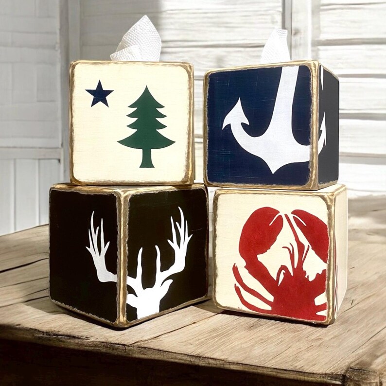 Anchor Tissue Box Covers displayed together in a nautical-themed vacation home, featuring hand-painted anchor design for beach cottages, coastal vacation homes, seaside cabins, or short-term rentals, ideal for bathroom, bedroom, or living space styling
