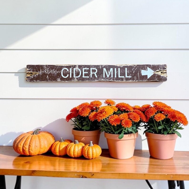 Handcrafted Cider Mill wood sign displayed in a cozy farmhouse surrounded by pumpkins and autumn decor, bringing the charm of apple orchards, fall harvest traditions, rustic country living, and vintage farmhouse style into your home