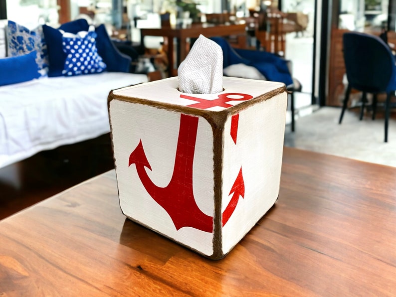 Coastal Anchor Tissue Box Cover styled in a beach cottage or vacation home, featuring hand-painted nautical anchor design for beach cottages, coastal vacation homes, nautical interiors, or seaside cabins, perfect for bedrooms, bathrooms, or living spaces
